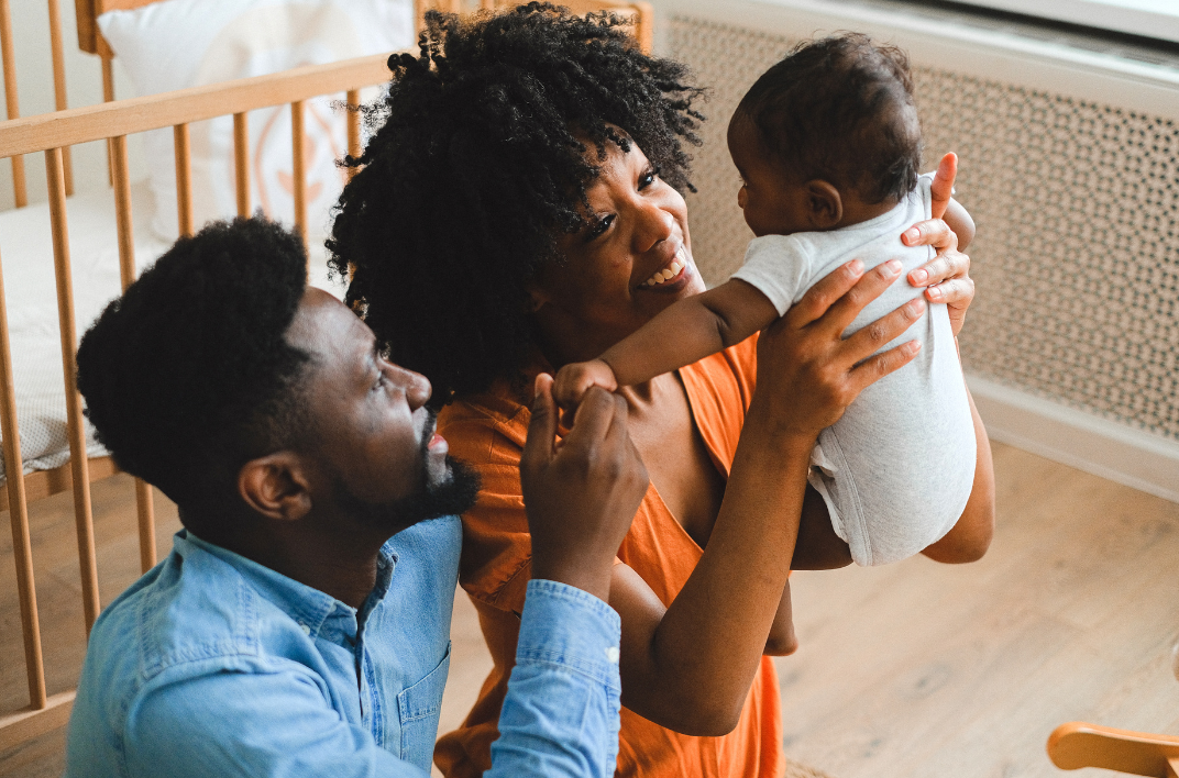 couple with newborn baby