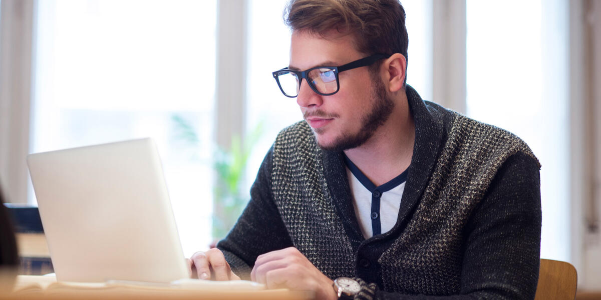 man on computer