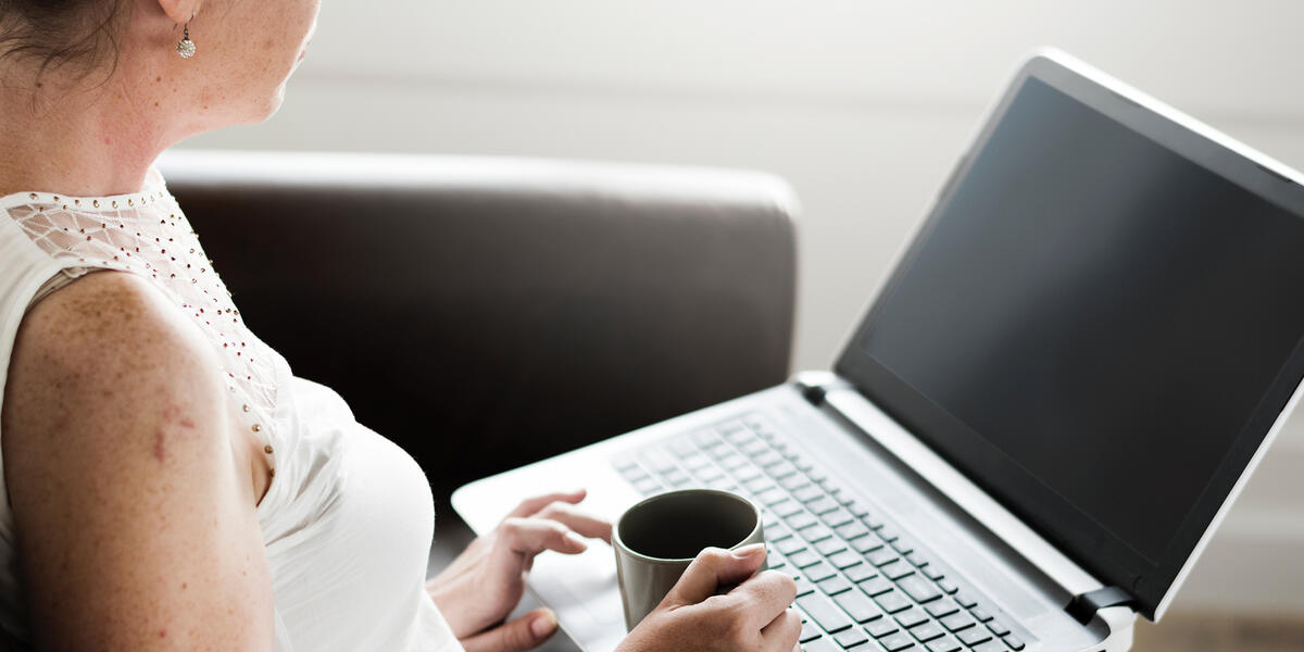 woman video chatting with her therapist