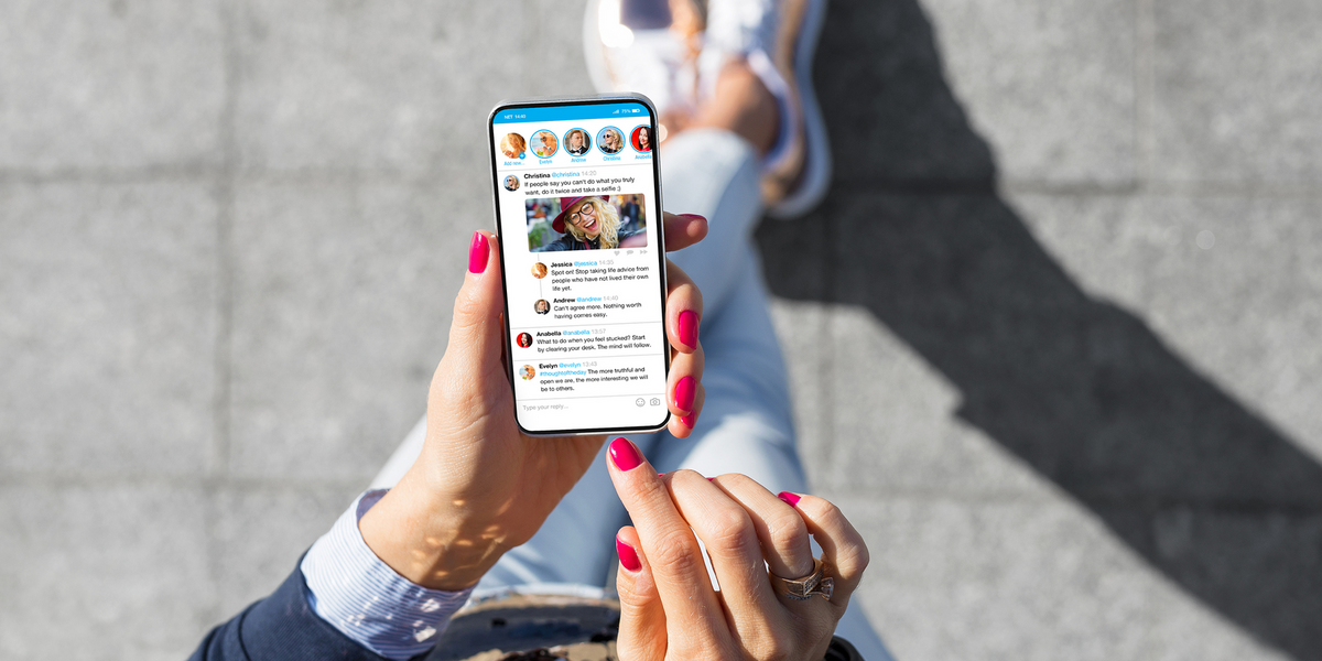 woman using social media on phone