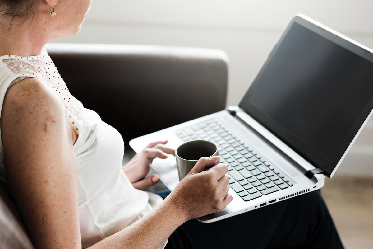 woman video chatting with her therapist