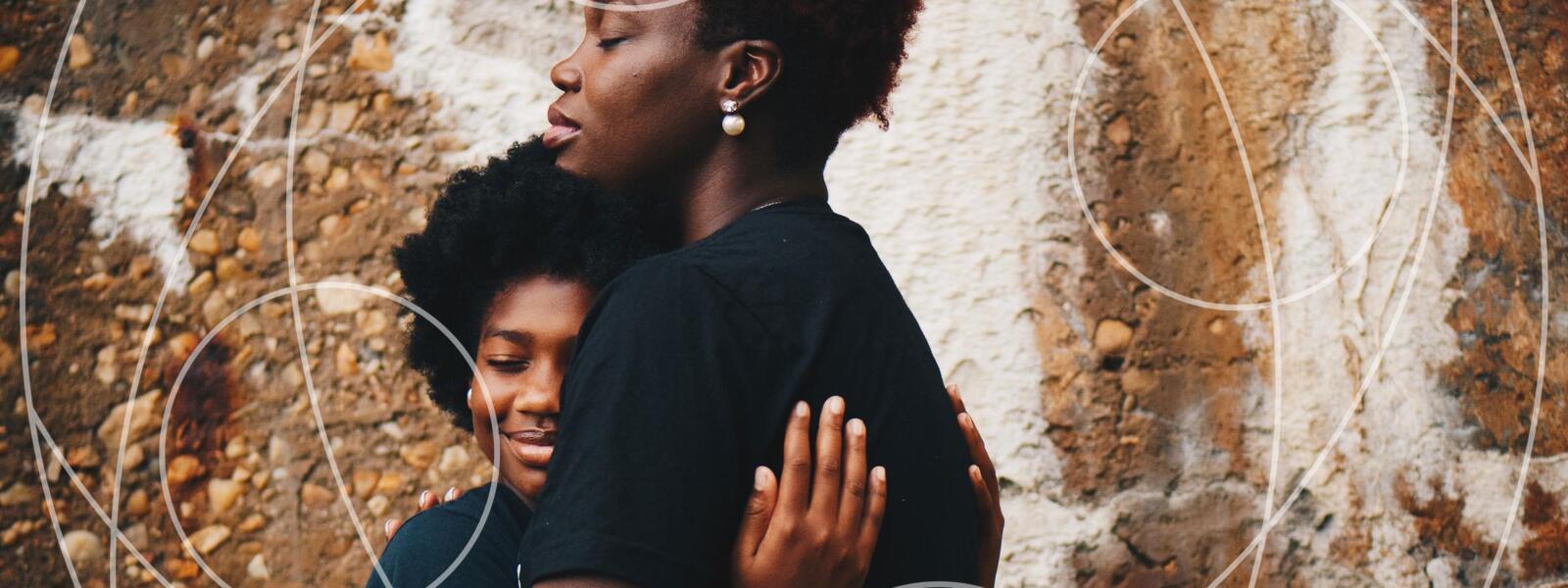 mother and daughter embrace