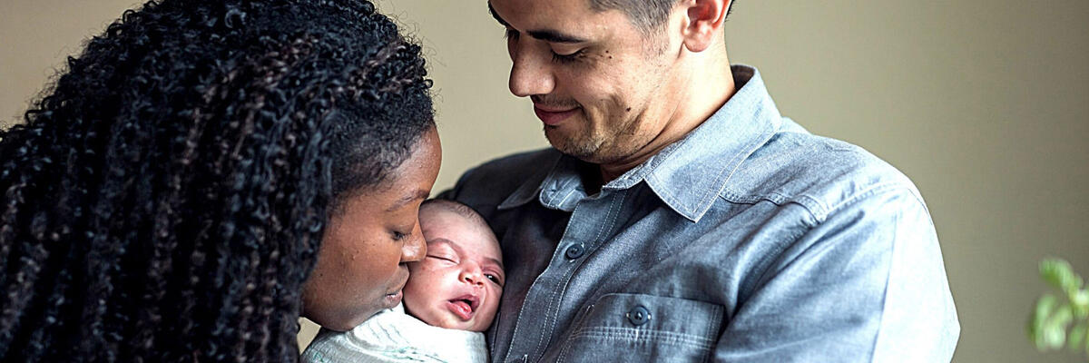 family with newborn baby
