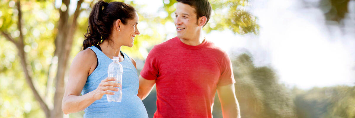 Couple walking woman pregnant Transition parenthood seminar