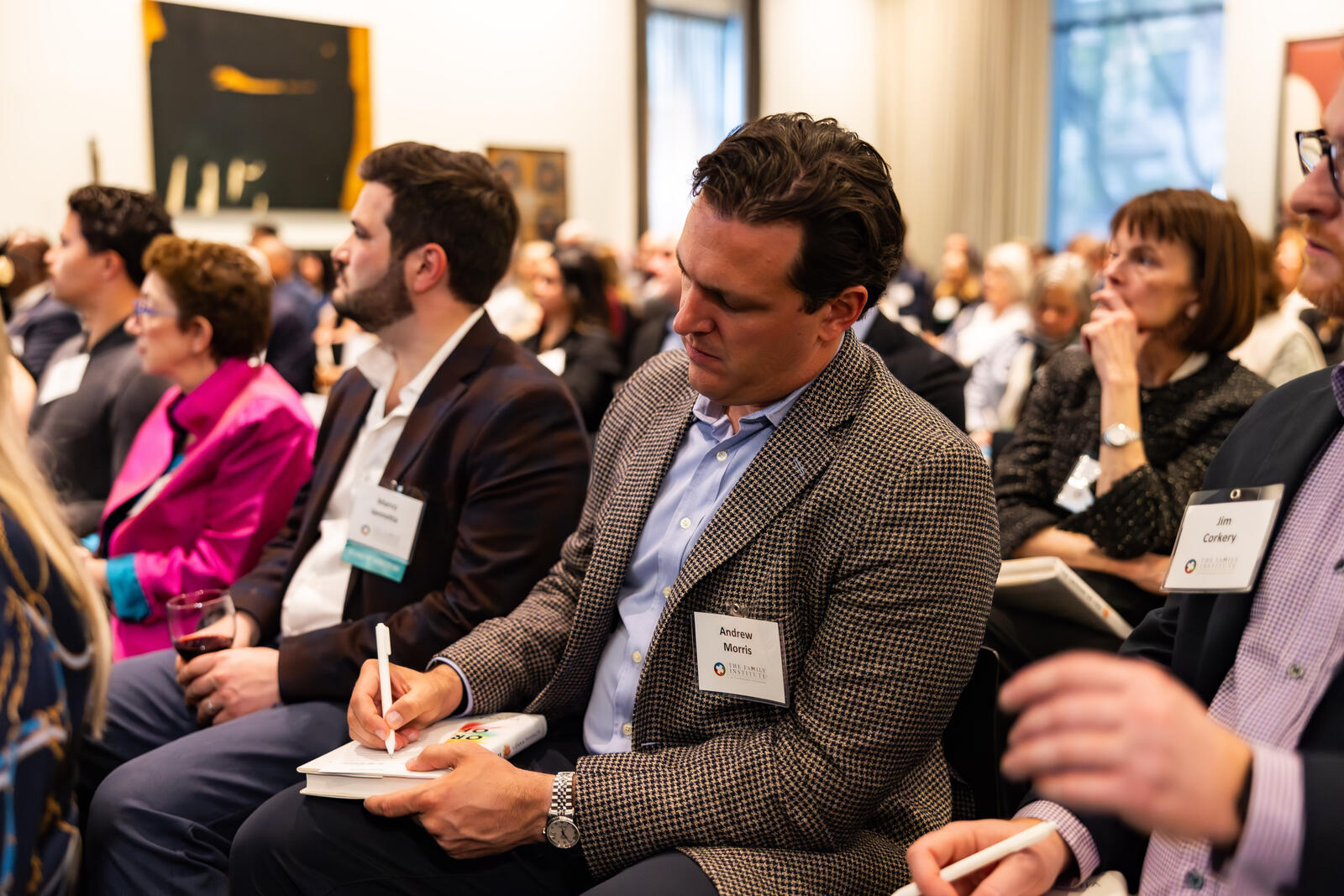 An In Session attendee takes notes.