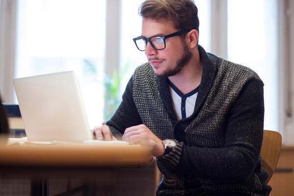 man on computer