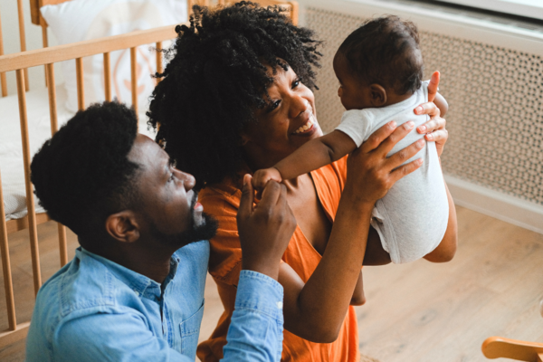 couple with newborn baby