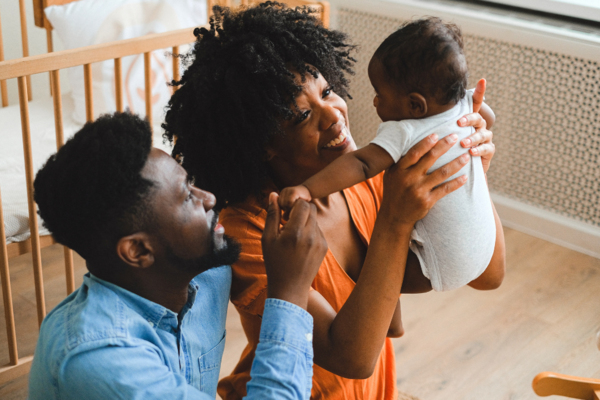 black couple with newborn baby