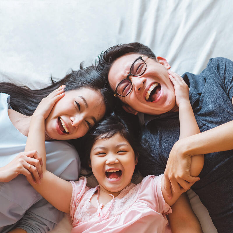 asian family hugging